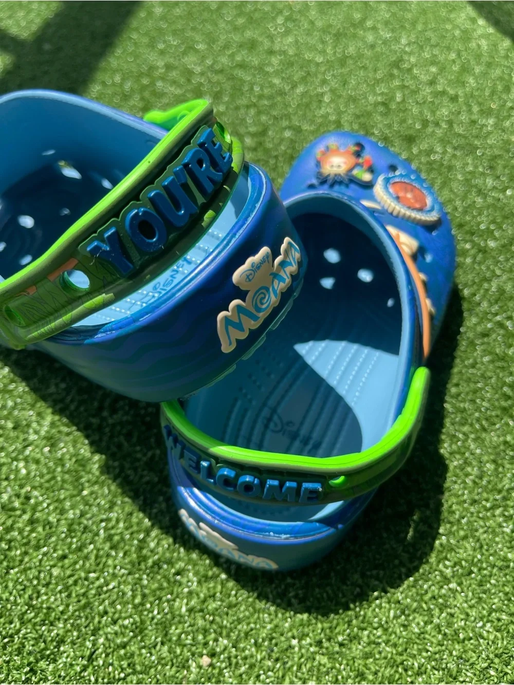 CROCS Moana Kids Blue Clog with Neon Green Strap and Ocean Charm Accents